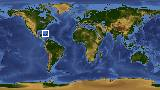 World map with latitude 23.2 and longitude -77.0 marked